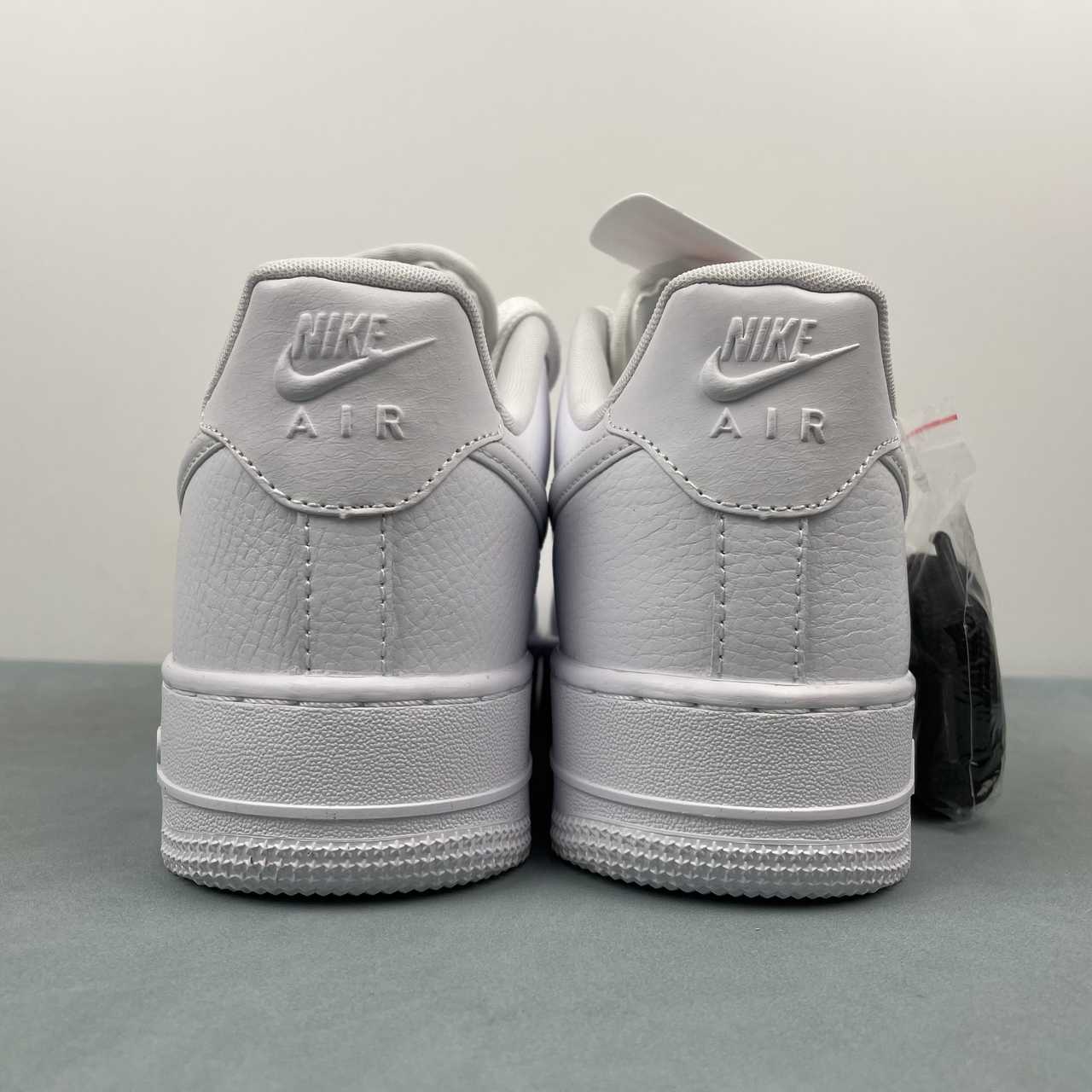 Nike Air Force 1 White Low '07 Next Nature Triple White Bulbous Swoosh