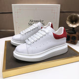 Alexander McQueen sneakers suola oversize bianco rosso