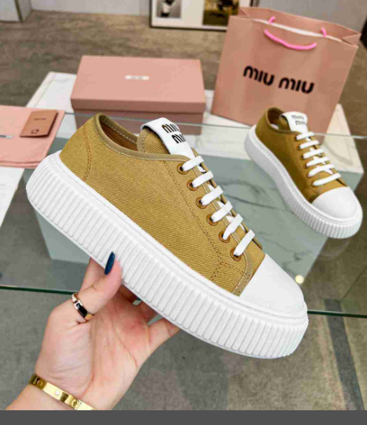 Miu Miu sneakers beige in tessuto Canvas