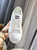 Miu Miu sneakers bianche in tessuto Canvas