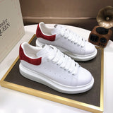 Alexander McQueen sneakers suola oversize bianco rosso
