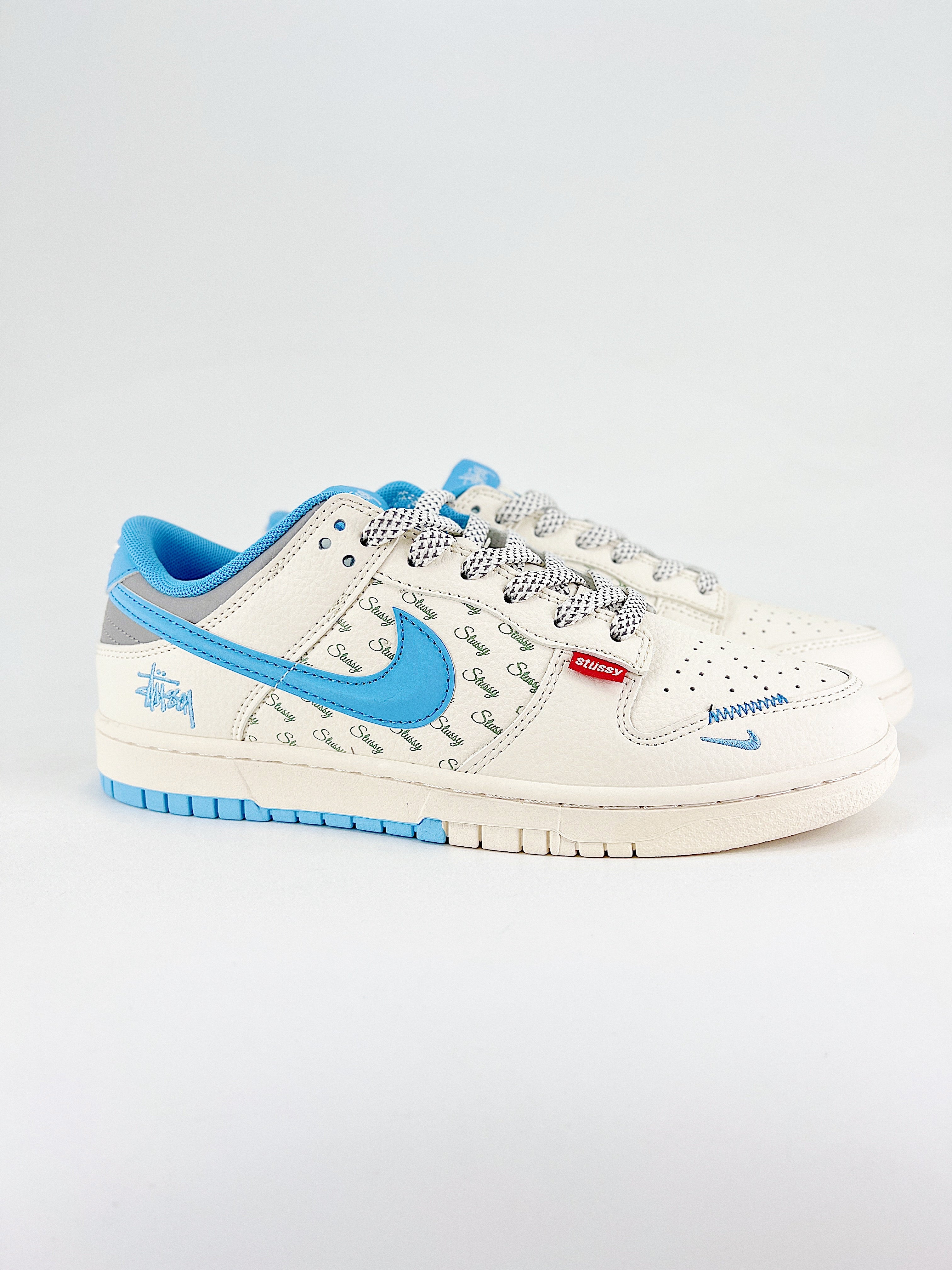 Nike New Dunk SB Low mod. Stussy celeste