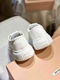 Miu Miu sneakers bianche in tessuto Canvas
