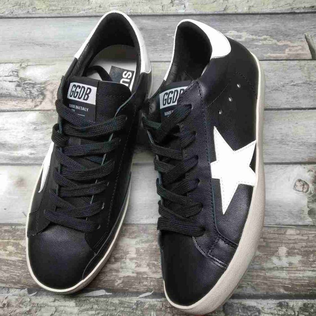 Golden Goose Superstar in pelle nera e stella bianca