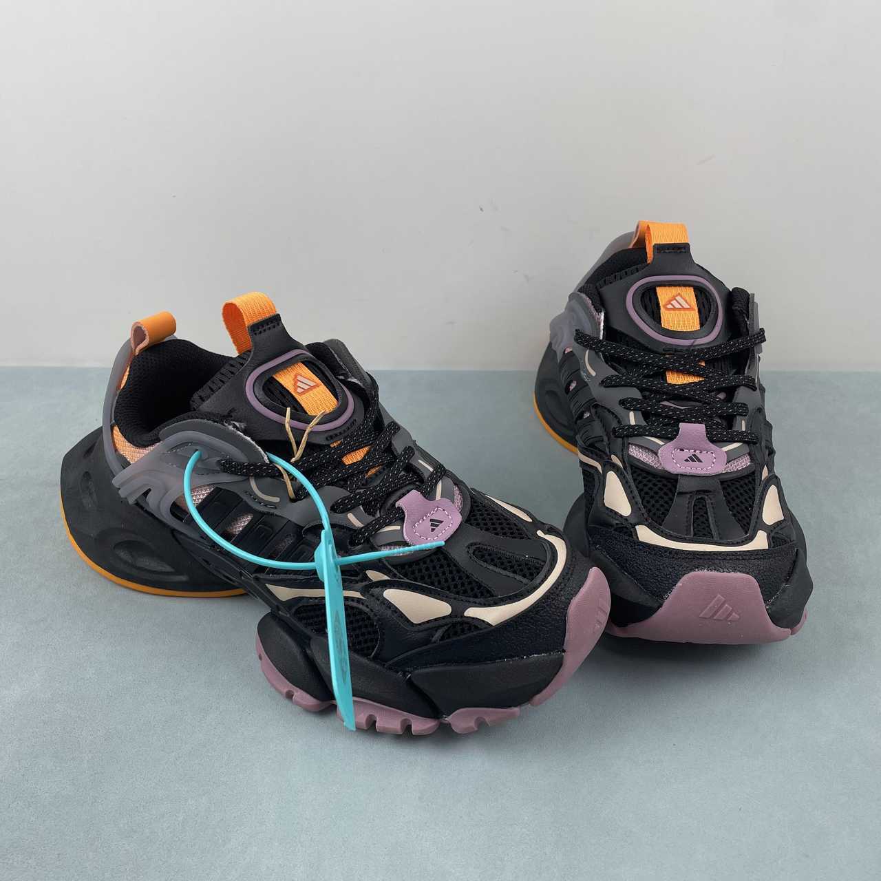 Adidas XLG Runner Deluxe sneakers core black pink orange grey