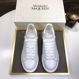 Alexander McQueen sneakers suola oversize bianco oro