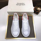 Alexander McQueen sneakers suola oversize bianco rosso