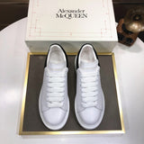 Alexander McQueen sneakers suola oversize bianco nero