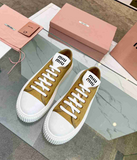 Miu Miu sneakers beige in tessuto Canvas
