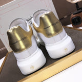 Alexander McQueen sneakers suola oversize bianco oro