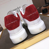 Alexander McQueen sneakers suola oversize bianco rosso