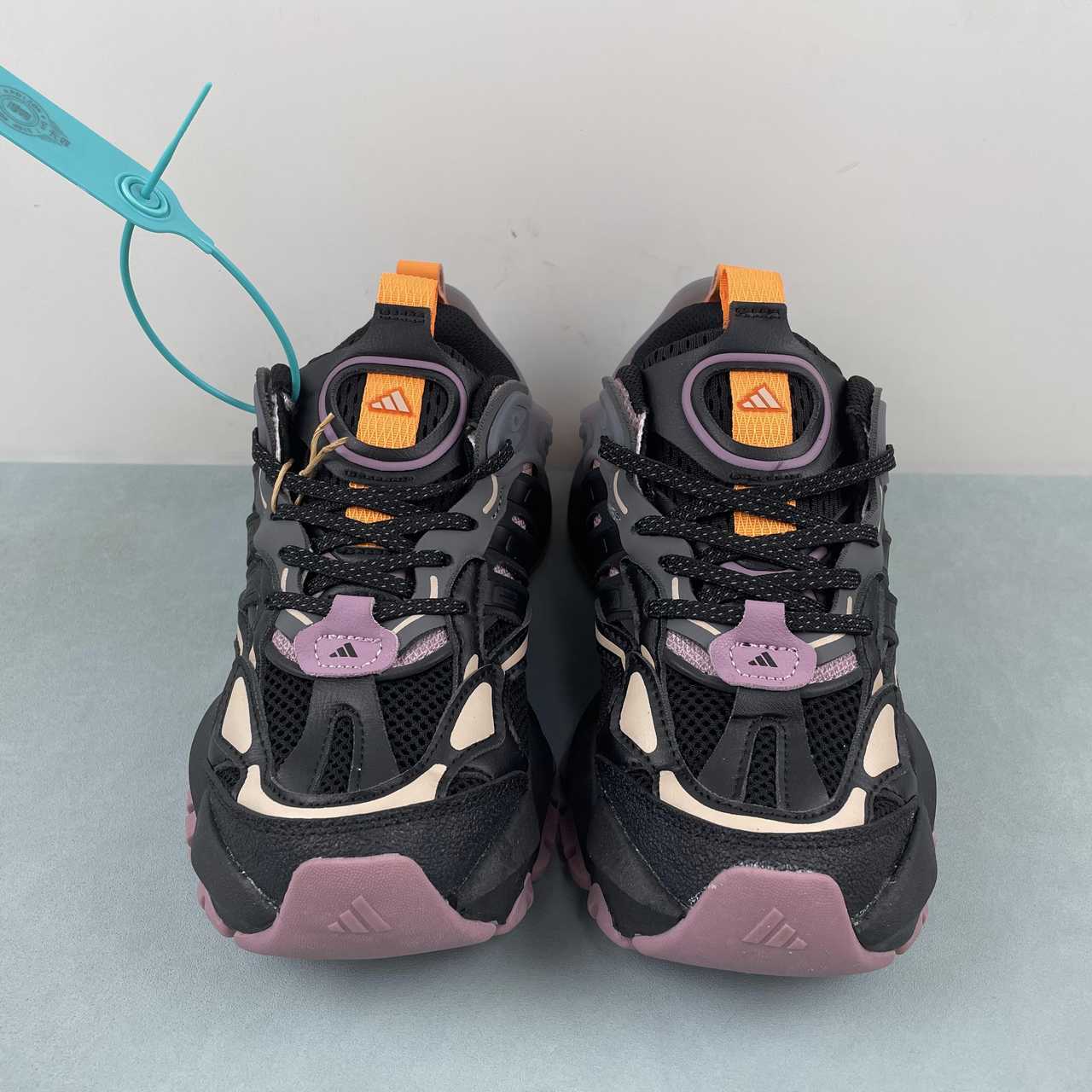 Adidas XLG Runner Deluxe sneakers core black pink orange grey