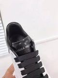 Alexander McQueen sneakers suola oversize bianco inserti neri