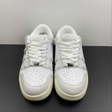 Amiri Skeleton Top Low white