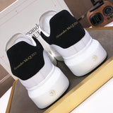 Alexander McQueen sneakers suola oversize bianco nero