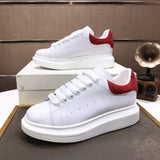 Alexander McQueen sneakers suola oversize bianco rosso