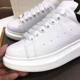 Alexander McQueen sneakers suola oversize bianco nero