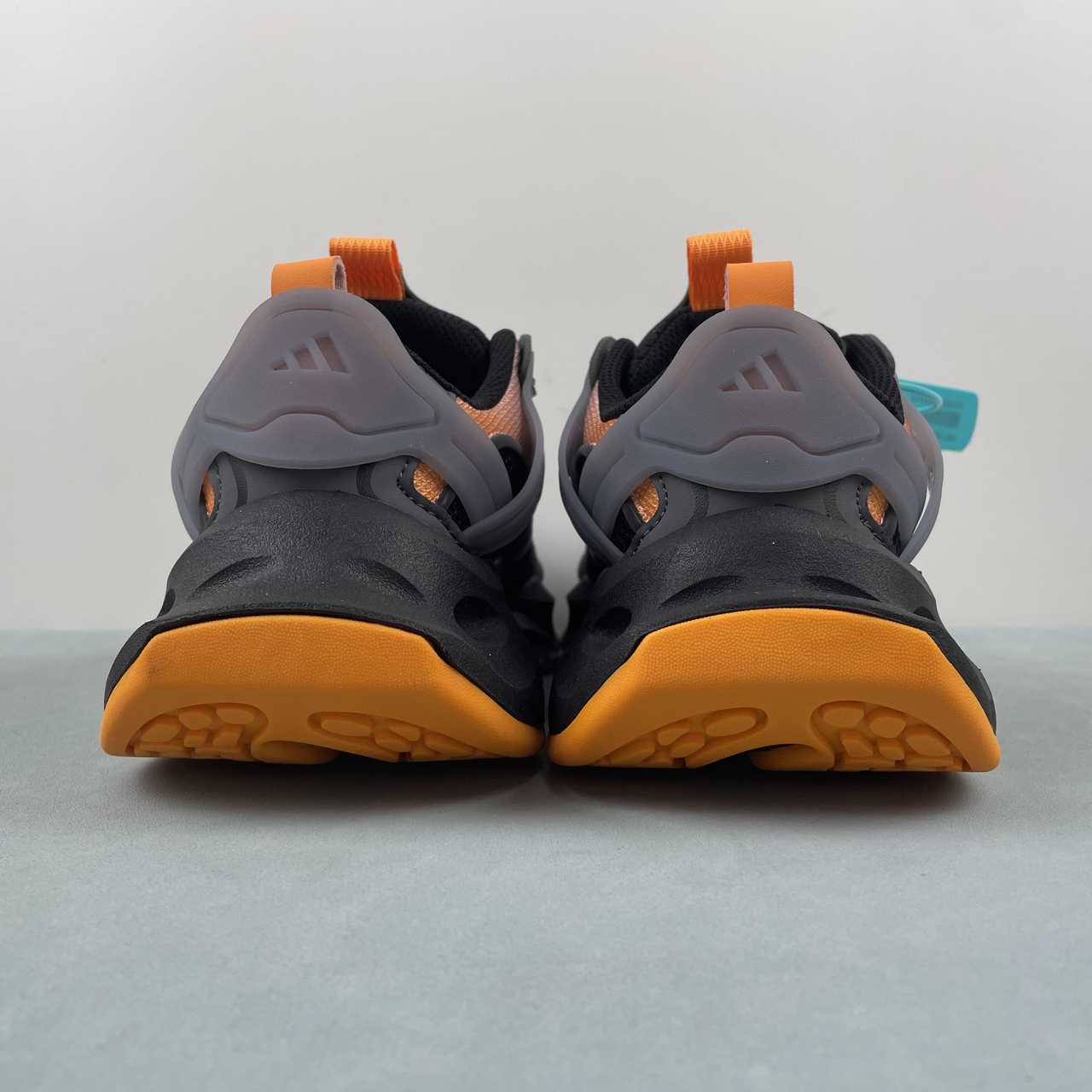 Adidas XLG Runner Deluxe sneakers core black pink orange grey