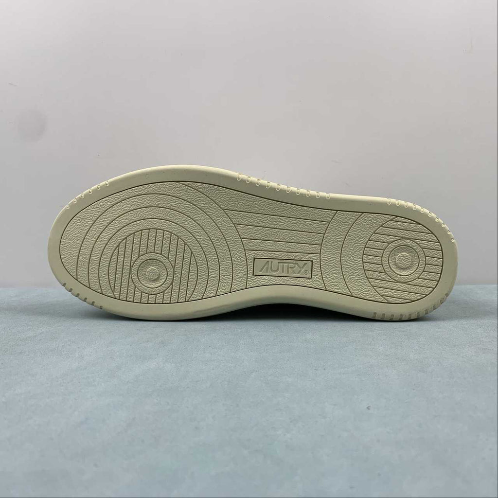 Autry Medalist Low bianca con talloncino verde